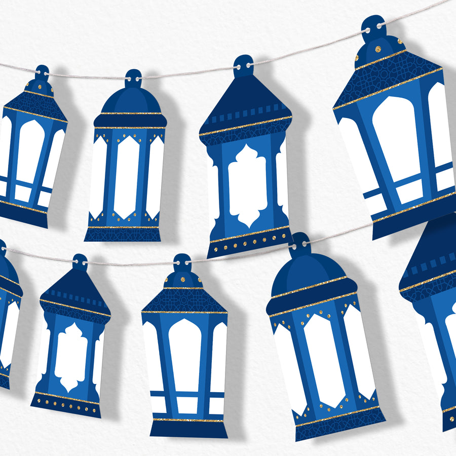 A garland of blue lantern-shaped decorations strung together with white cording, designed for Ramadan celebrations.