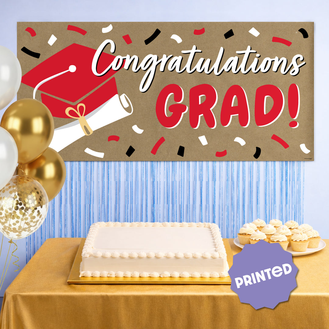 Red graduation banner used as graduation party backdrop