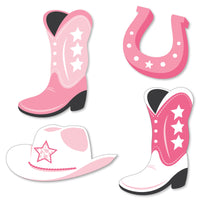 A set of paper cut-outs in the shapes of cowboy boots, cowgirl hats, and horseshoes, predominantly pink with white accents and star decorations.