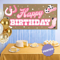 Cowgirl birthday party backdrop with boots and horseshoes