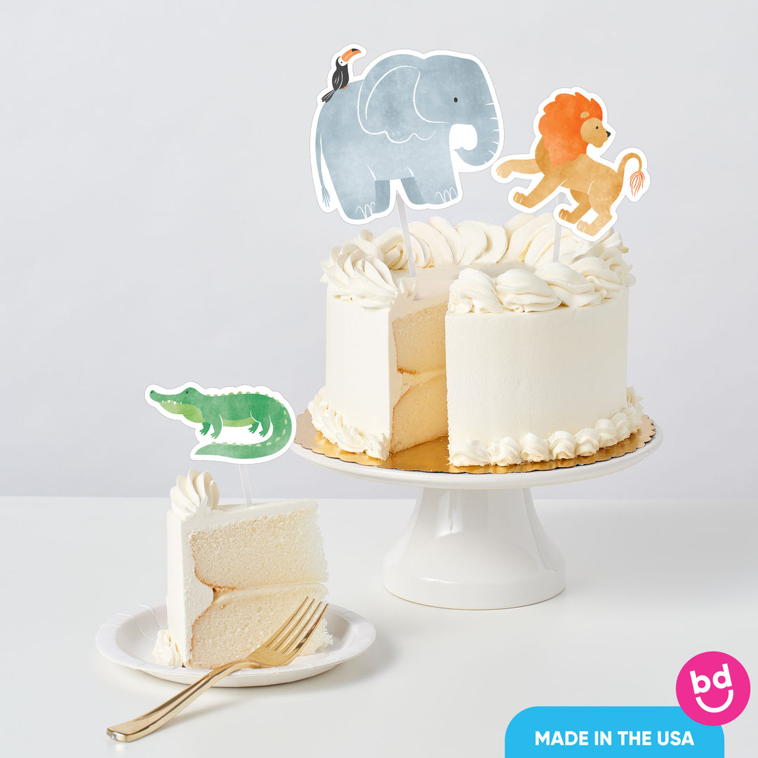 jungle themed birthday cake with animal toppers