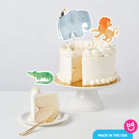 jungle themed birthday cake with animal toppers