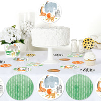 Safari animals table confetti styled for jungle birthday party decor