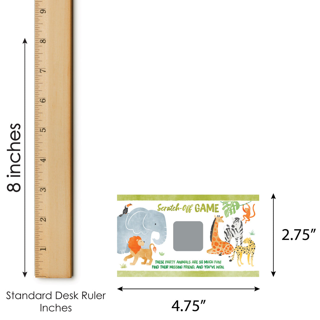 Small scratch-off game card with animals on a white background, next to a standard desk ruler for scale.