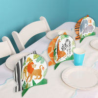 Safari birthday dessert table with jungle centerpieces