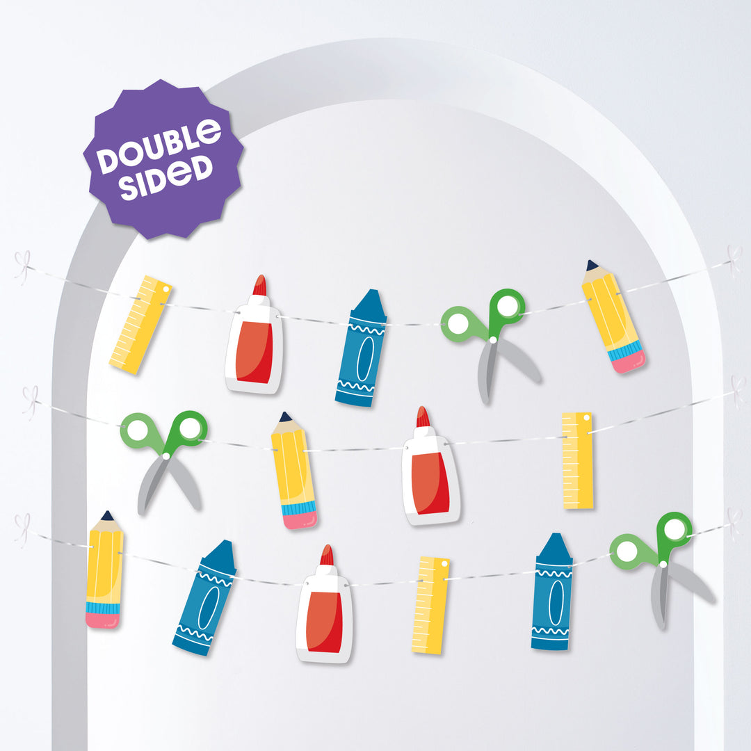 Back to school classroom wall display with school supplies garland banner