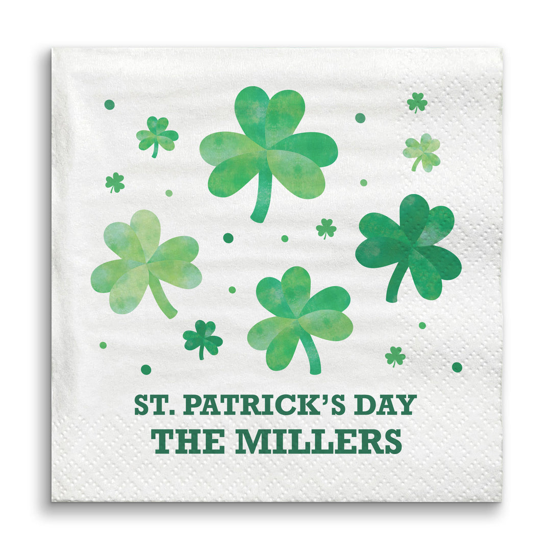 St. Patrick's Day-themed napkin with green shamrocks and personalized text on a white background