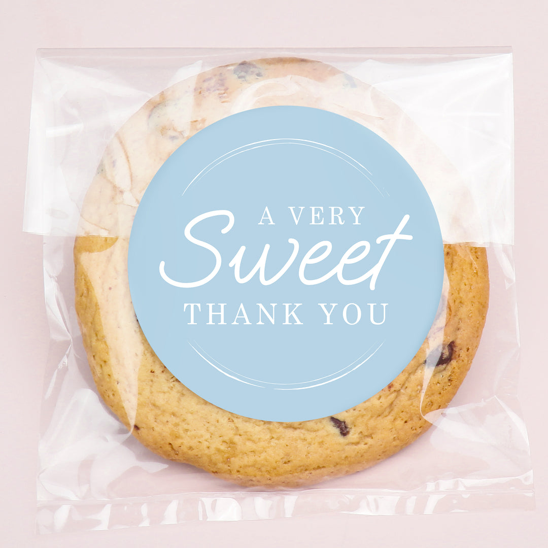 Cookie with a 'A Very Sweet Thank You' label on a pink background