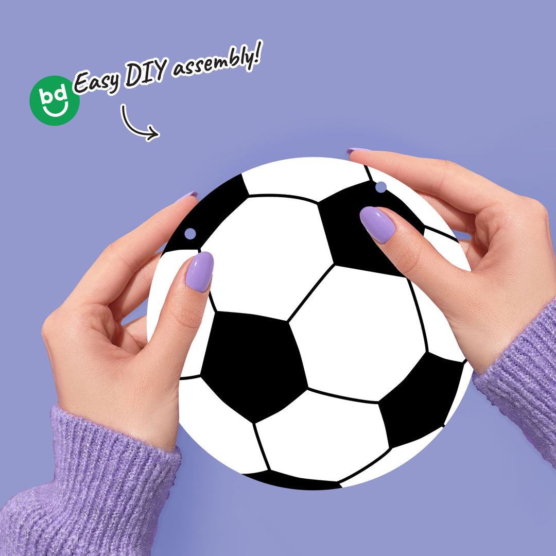 Hands holding a soccer ball design with 'Easy DIY assembly!' text and BG logo on a purple background