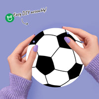 Hands holding a soccer ball design with 'Easy DIY assembly!' text and BG logo on a purple background