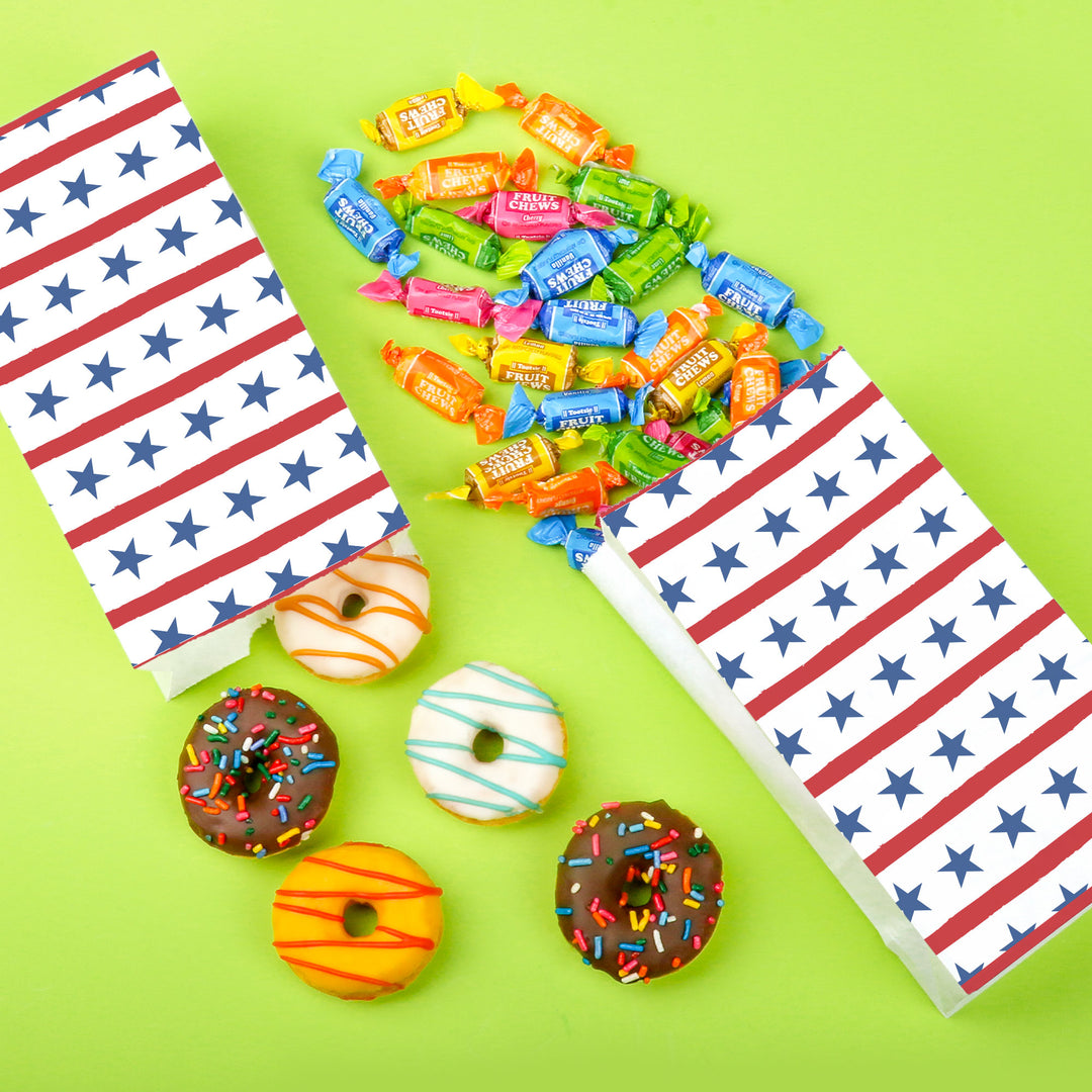 Snack table with popcorn bags at patriotic summer party