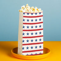Red stripe and blue star popcorn bag design close up