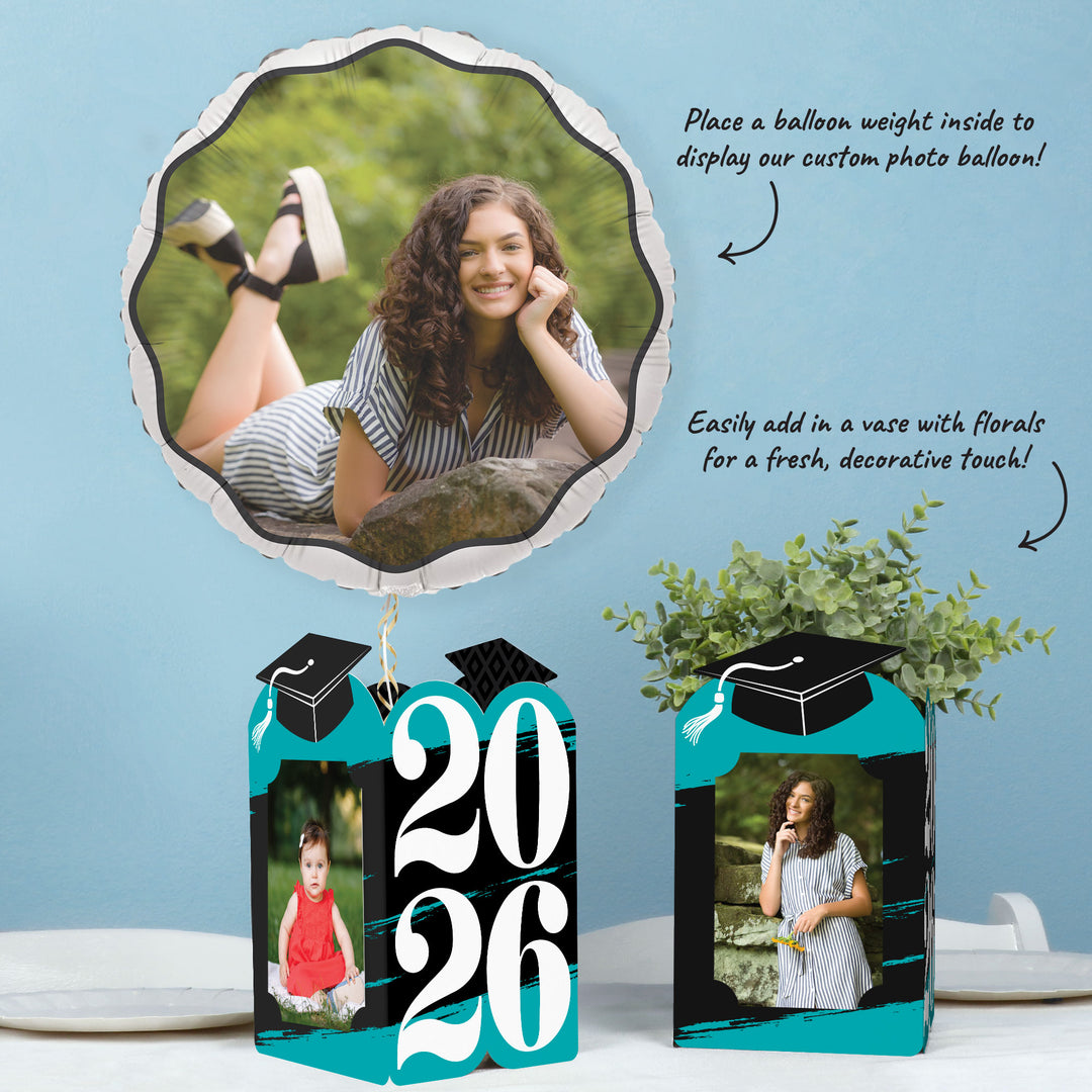 Teal graduation party table styled with photo holders