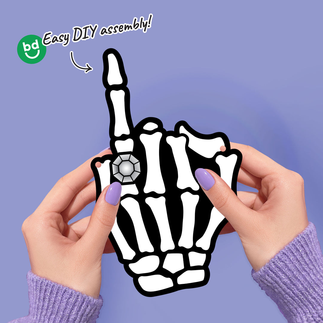 Close-up of gothic skeleton ring finger banner piece