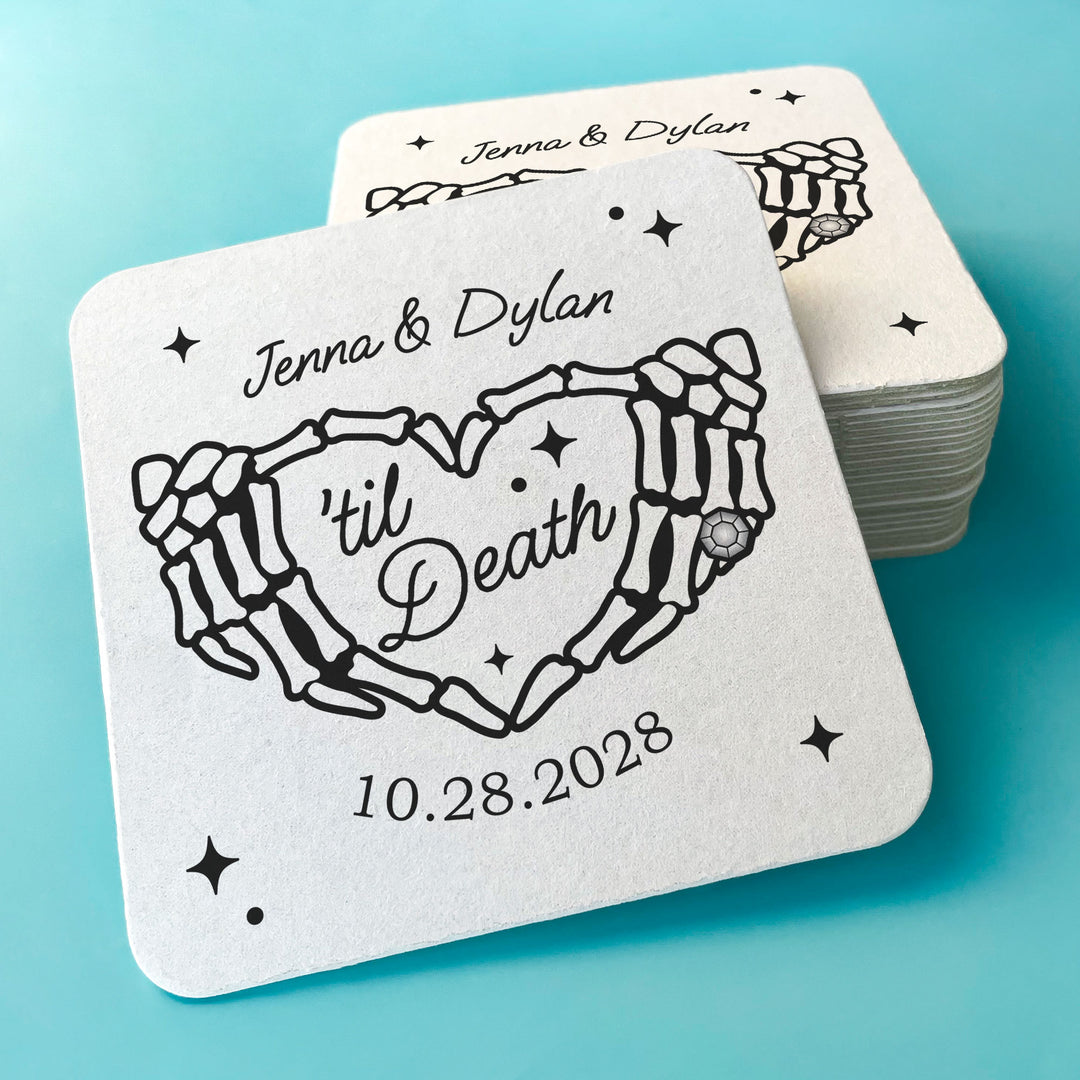 Stack of 100 personalized gothic wedding coasters for drink station