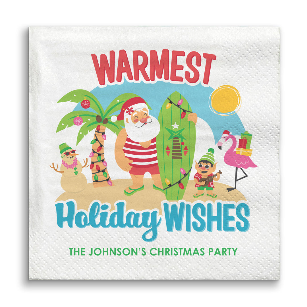 Napkin with Santa Claus and tropical elements, featuring 'Warmest Holiday Wishes'.