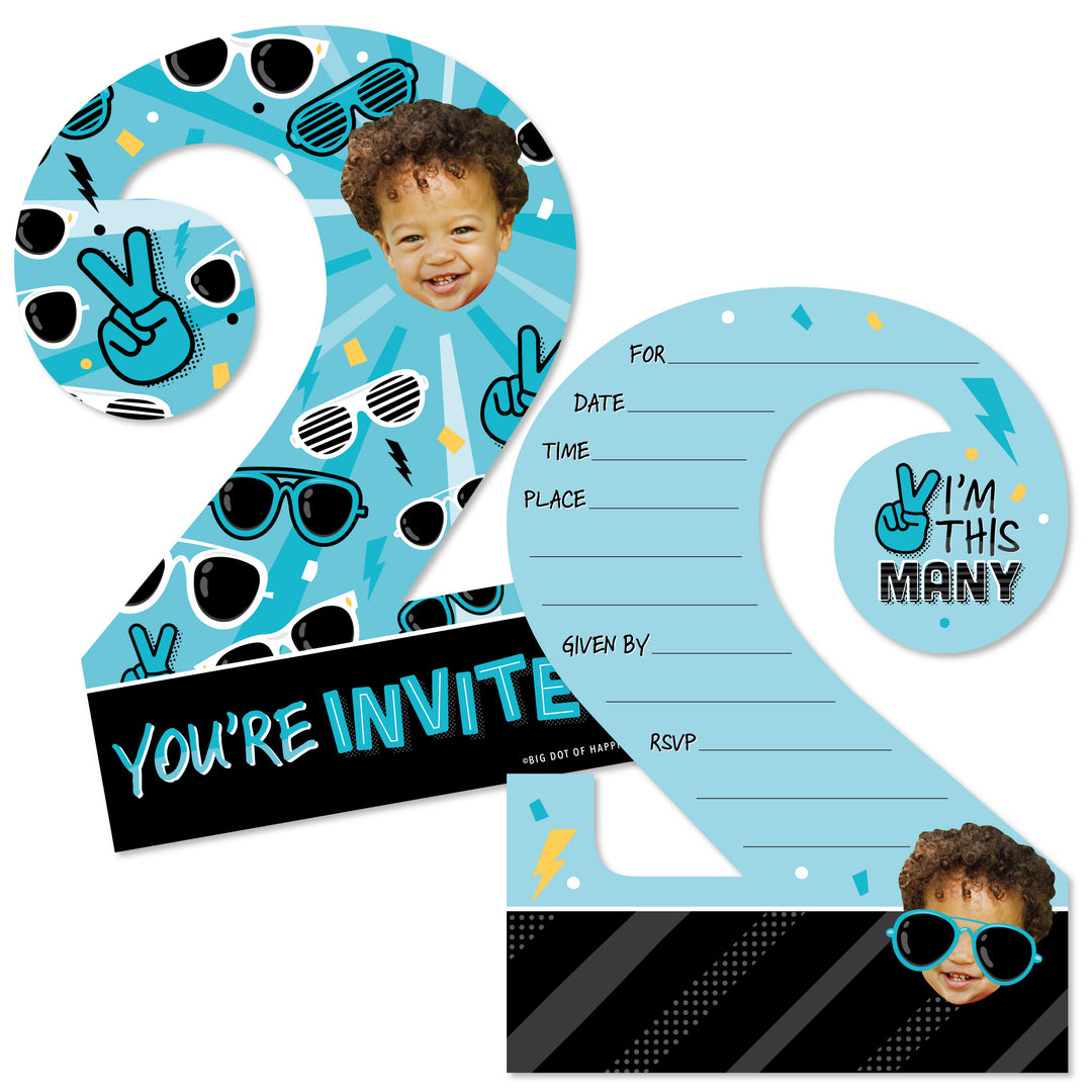 A set of customized birthday invitation cards with a blue number two shape, decorations, and a space for a photo. The cards are meant for a boy's 2nd birthday party.