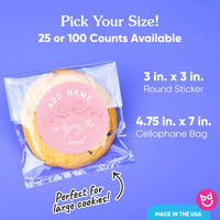 Cookie with a pink round sticker and packaging information on a blue background