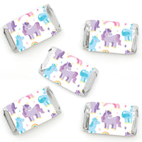 Unicorn and rainbow patterned candy wrappers on a white background perfect for unicorn party favors 