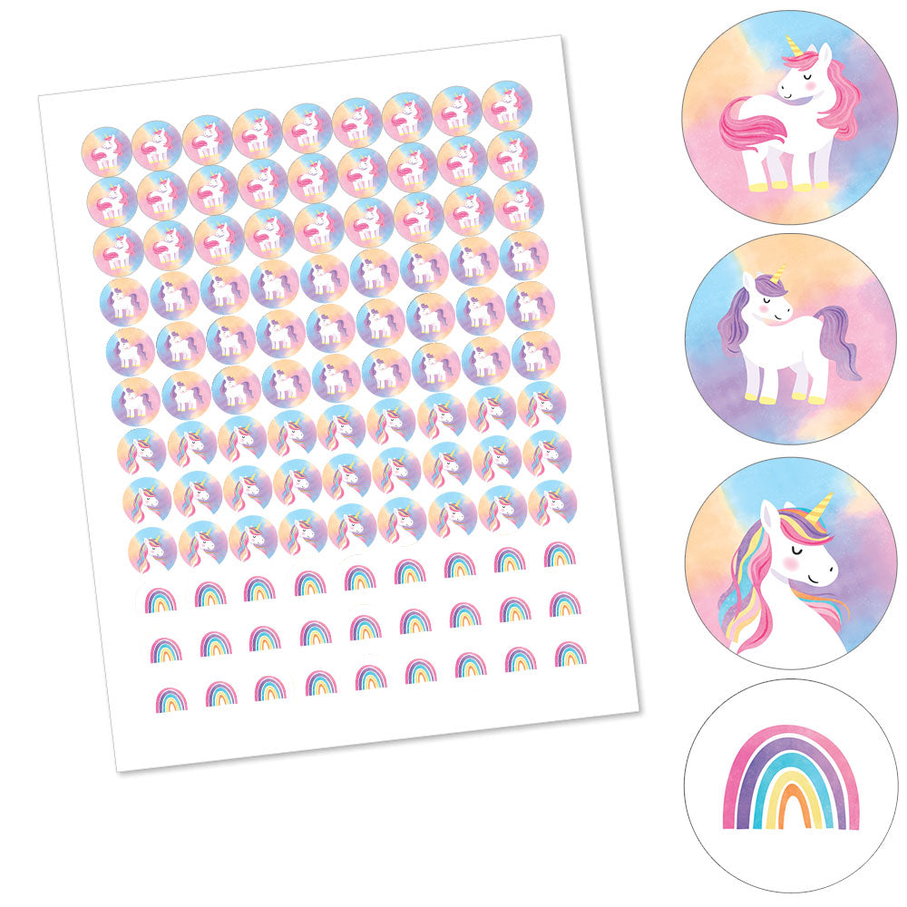 Sheet of unicorn and rainbow stickers meant for small candy favors with close-up illustrations on a white background