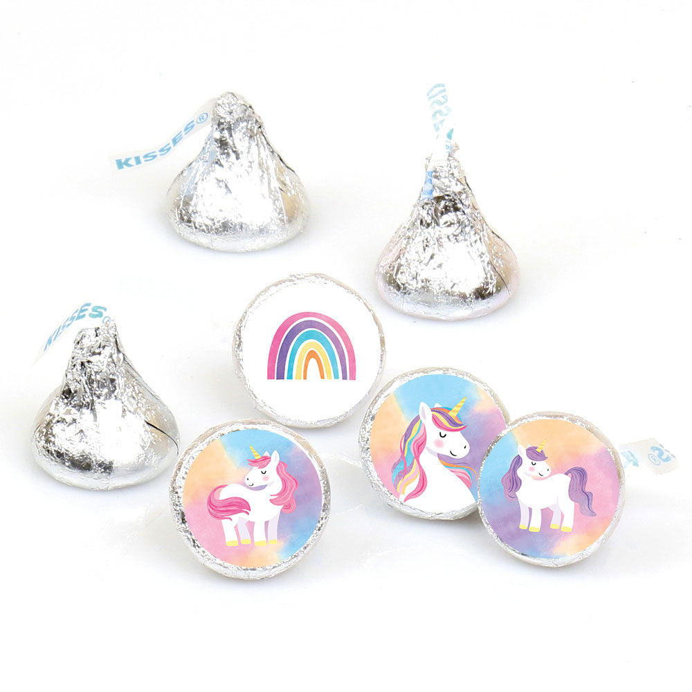 Hershey's Kisses with unicorn and rainbow stickers on a white background unicorn party favors