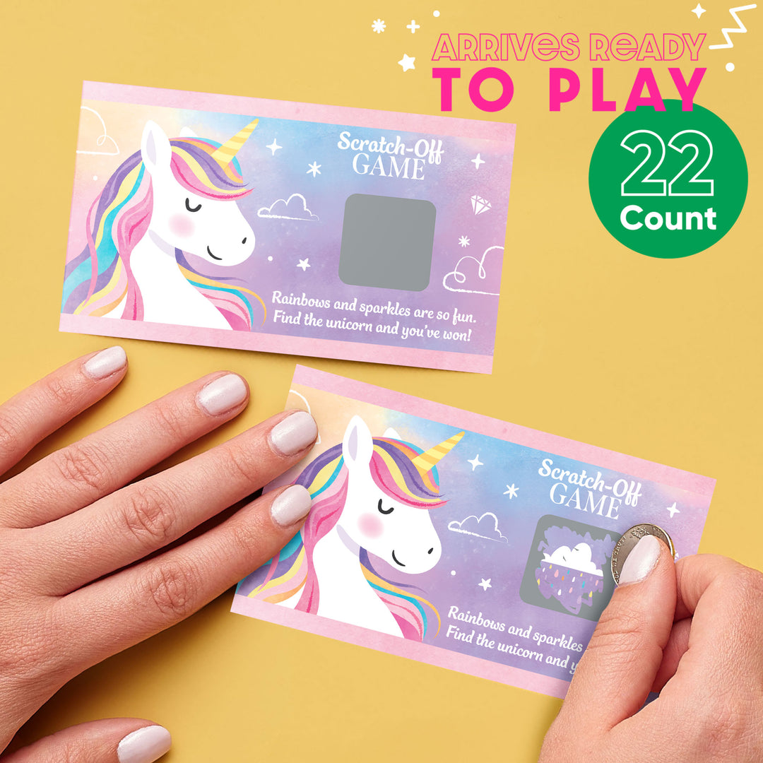Unicorn-themed scratch-off game cards with a hand interacting with them on a yellow background.