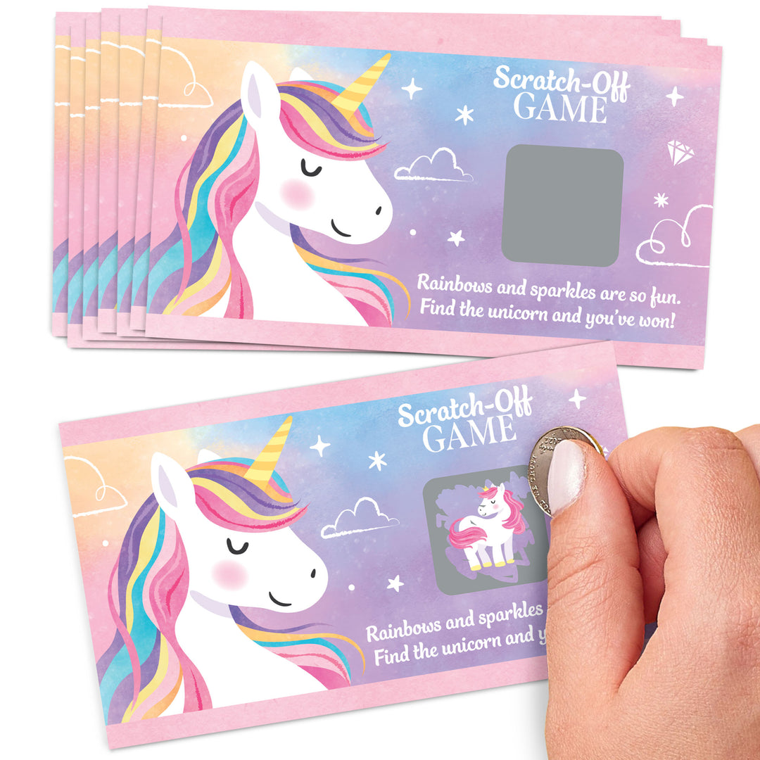 Unicorn-themed scratch-off game cards with a hand scratching one of them.