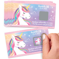 Unicorn-themed scratch-off game cards with a hand scratching one of them.