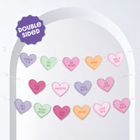Heart-shaped banner with Valentine's Day phrases on a white background