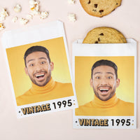 Two vintage-style photo cards with a man's face, labeled 'Vintage 1995', on a pink background with cookies and popcorn.