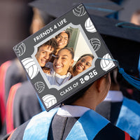 Styled graduation cap with volleyball themed topper