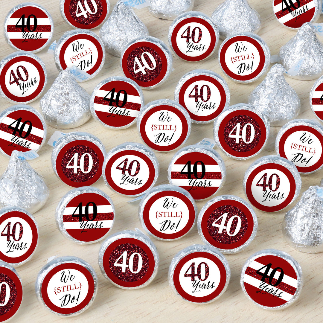 A collection of round candy stickers with 'We Still Do - 40th Wedding Anniversary' theme in red and white colors.