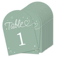 Stack of green table number cards with 'Table 1' printed on them.