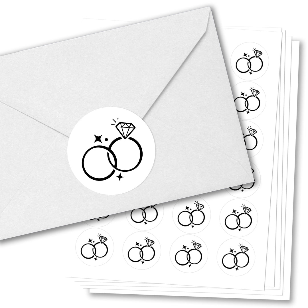 Envelopes with wessing ring design stickers on a white background