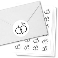 Envelopes with wessing ring design stickers on a white background