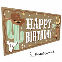 Close-up of cowboy hat and horseshoe artwork