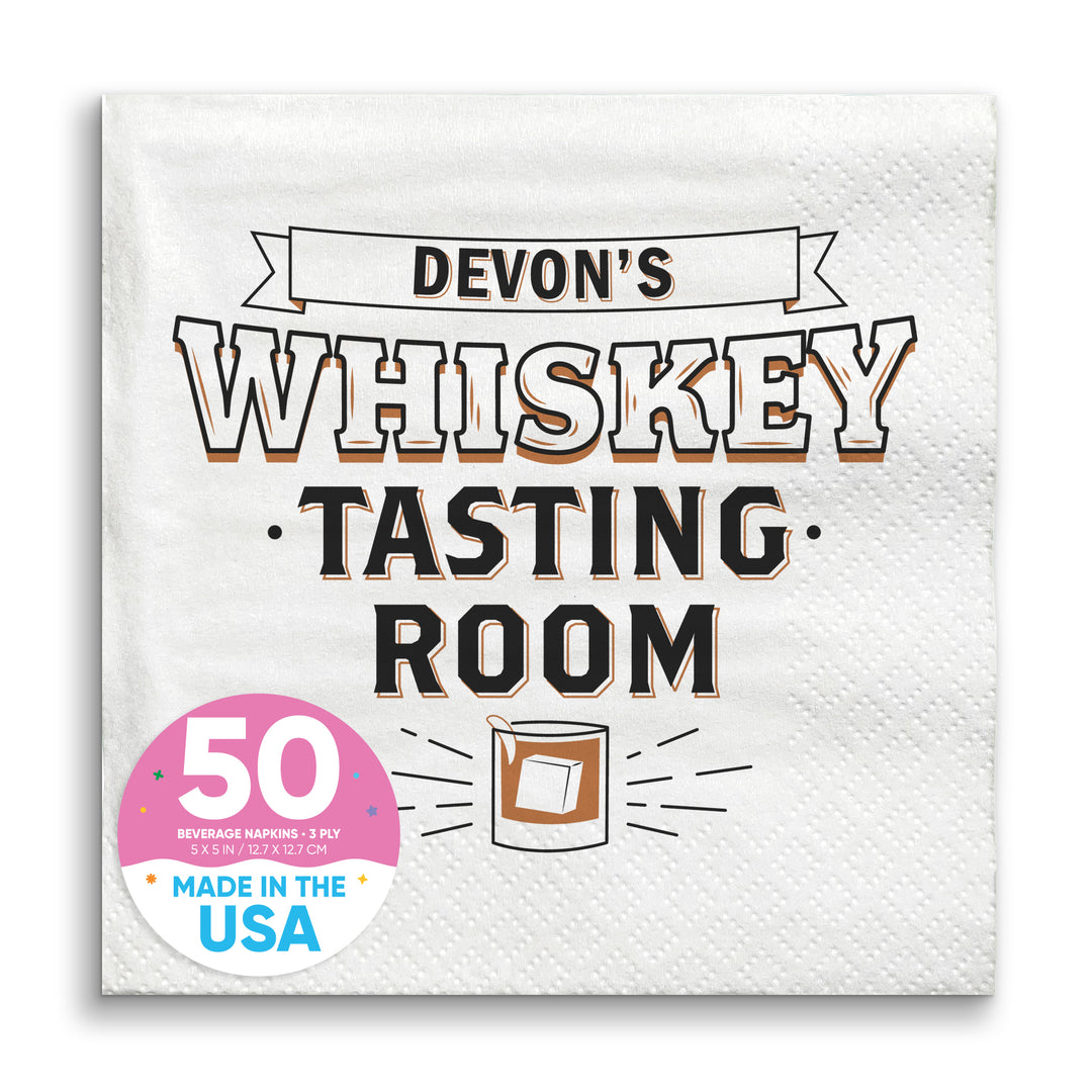 A white paper napkin with 'WHISKEY TASTING ROOM' printed in black text and a graphic of a drink glass.