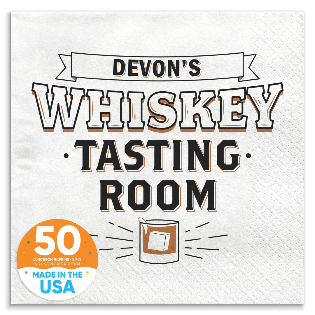 A white paper napkin with 'WHISKEY TASTING ROOM' printed in black text and a graphic of a drink glass.