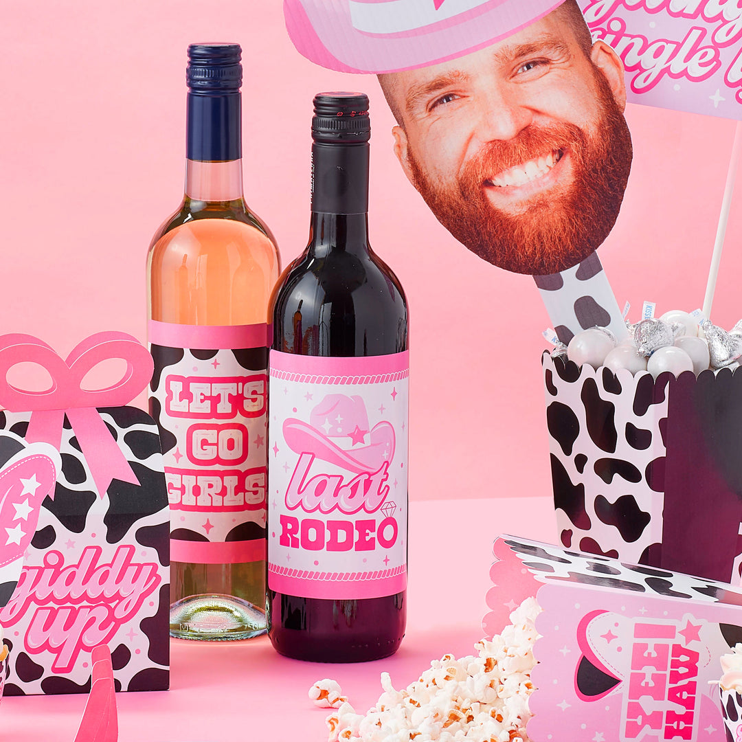 Hot Pink Last Rodeo Bachelorette Party supplies on a table 