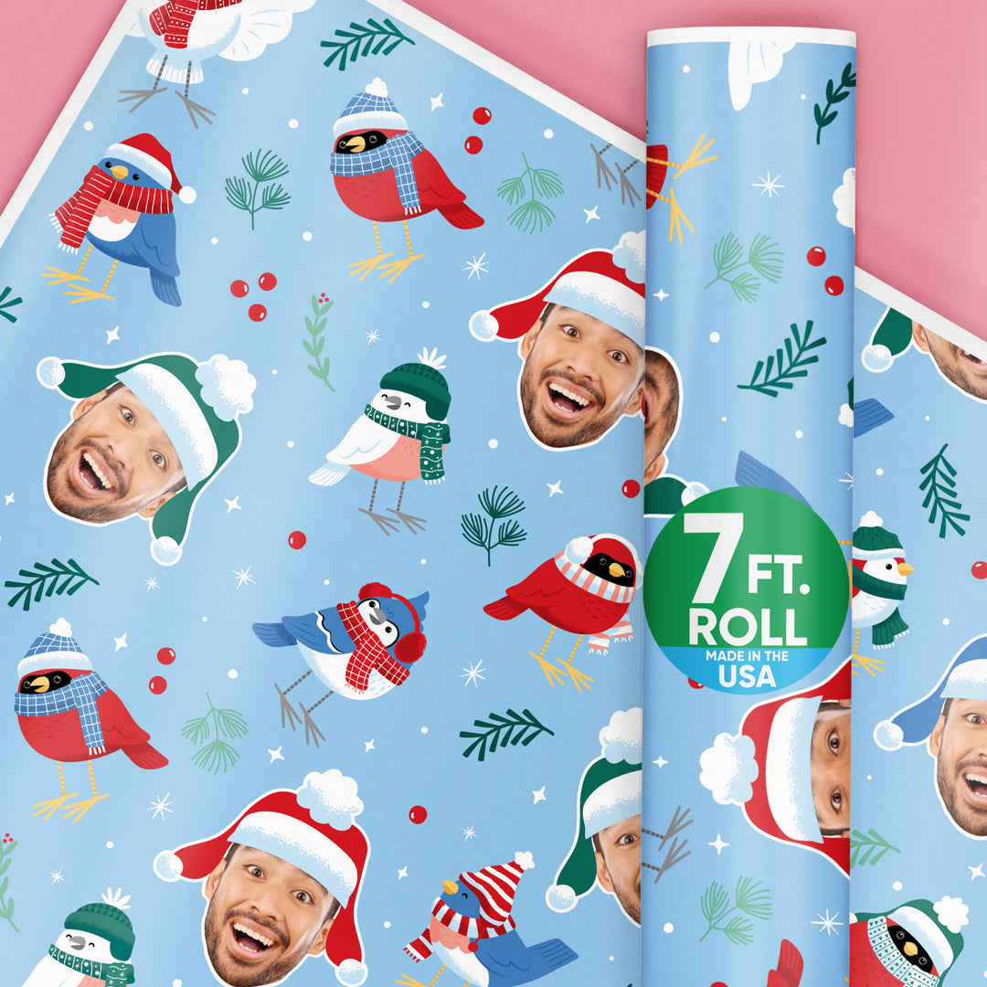 Custom Christmas-themed wrapping paper with cartoon characters and '7 Ft. Roll' label on a blue background.
