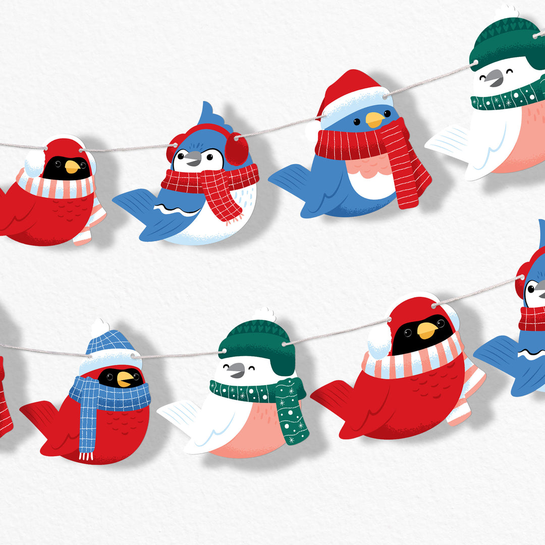 Decorative winter banner with cartoon birds wearing winter clothing on a white background