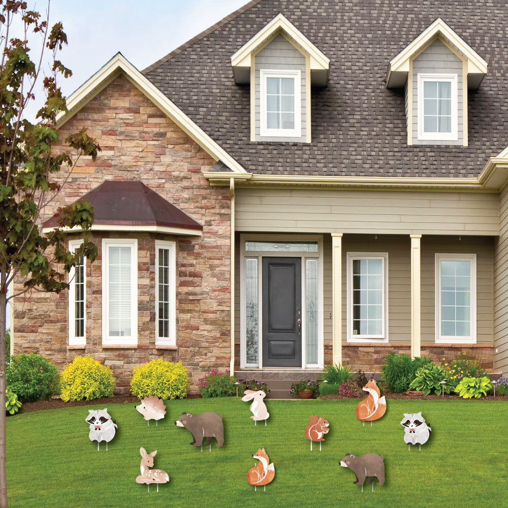 House with decorative animal yard signs on the lawn