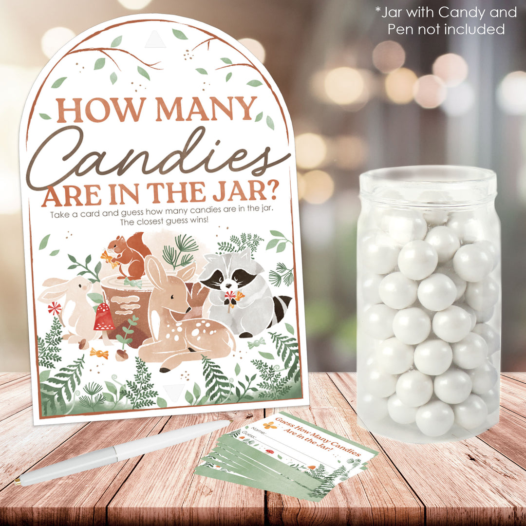 Jar with candy and a guessing card on a wooden surface, woodland animals baby shower game activity