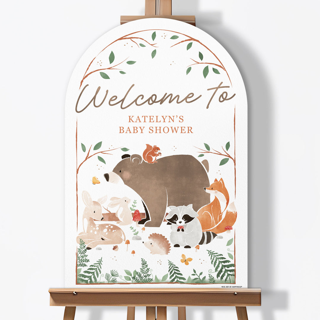 Woodland animal-themed baby shower sign on an easel with 'Welcome to Katelyn's Baby Shower' text.