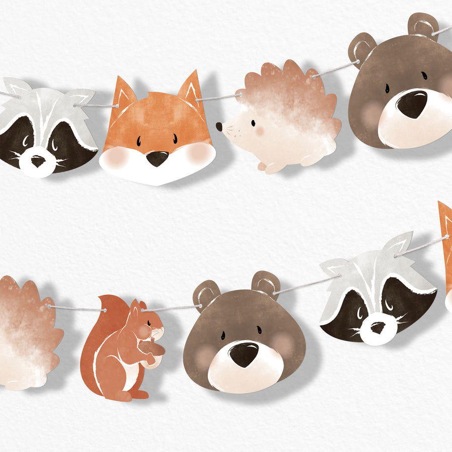 Woodland animal-themed garland banner for baby shower on a white background