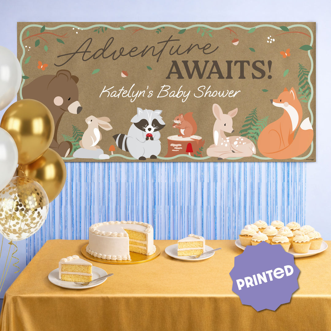 Forest animal banner styled at woodland first birthday party
