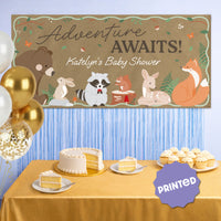 Forest animal banner styled at woodland first birthday party