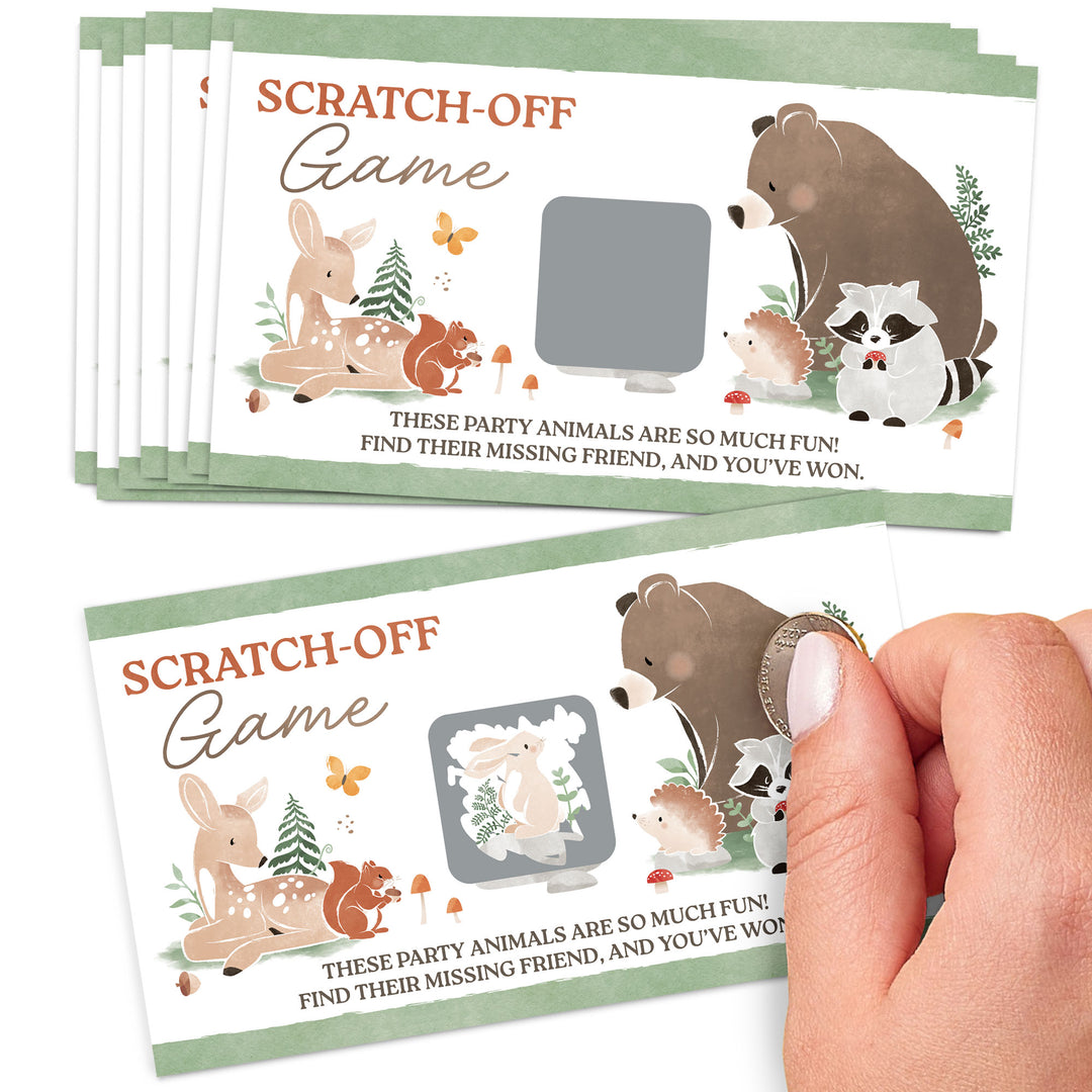 Stack of scratch-off baby shower game cards with animal illustrations on a white background