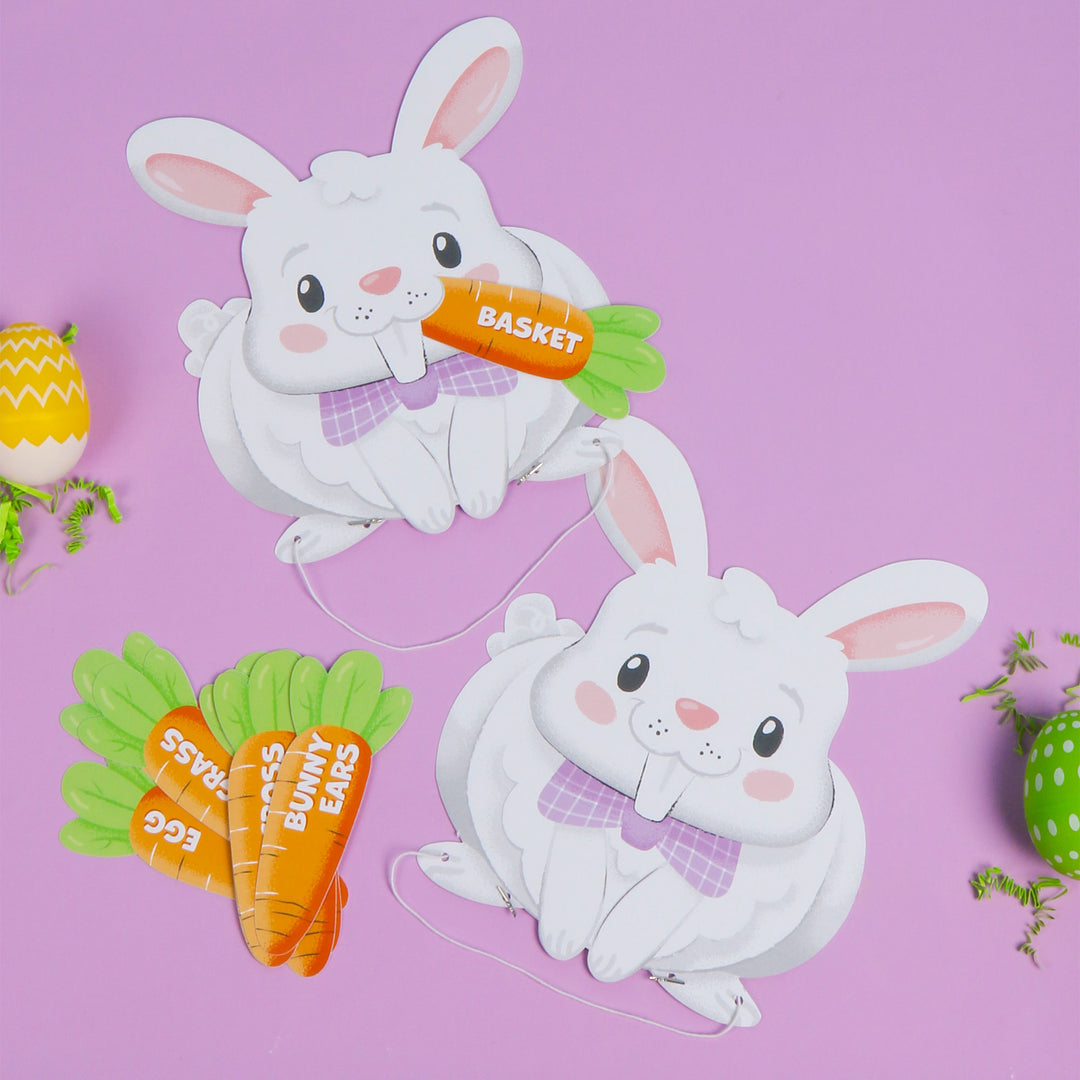 Two paper bunny headband game cutouts with Easter-themed guessing cards on a purple background
