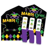 A set of colorful Mardi Gras mask themed pull tabs game cards displayed on a table with masks and festive designs.